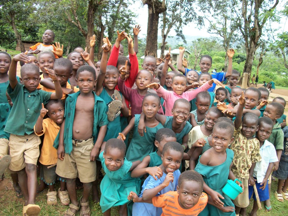 Group of Ghanaian children of mixed ages.